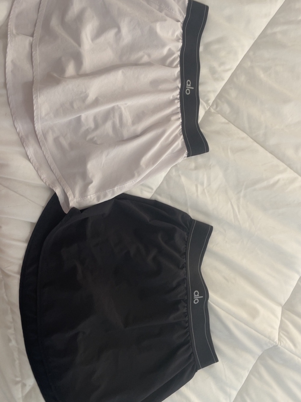 Black and white size L alo skirts, 90$ for both.